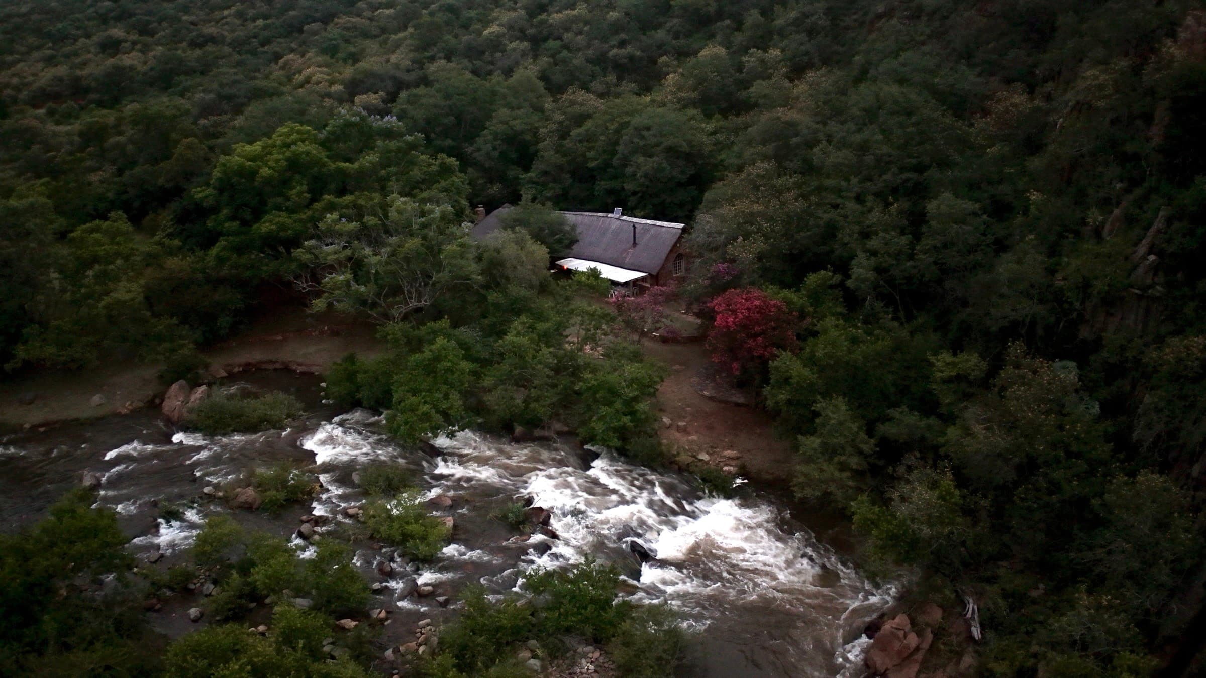 Drone view of the stone family cottage on the Spekboom Rivier outside Lydenburg, South Africa, where the name was found